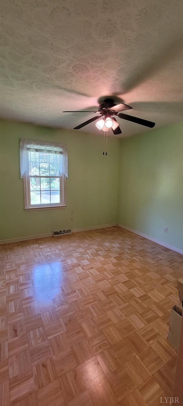1769 Izaak Walton Rd, Madison Heights, VA 24572 - spare room featuring ceiling fan and a textured ceiling