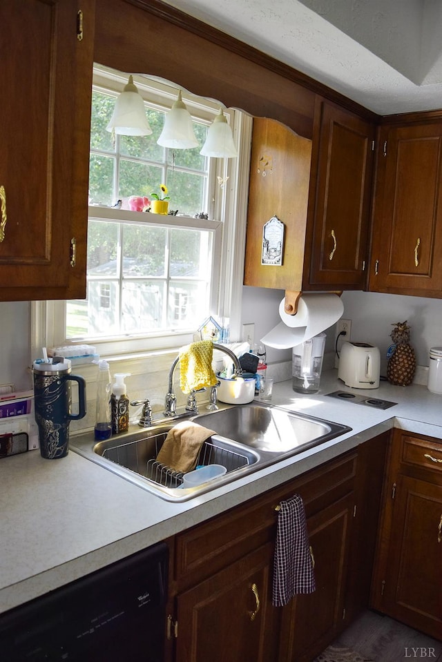 1769 Izaak Walton Rd, Madison Heights, VA 24572 - kitchen featuring black dishwasher and light countertops