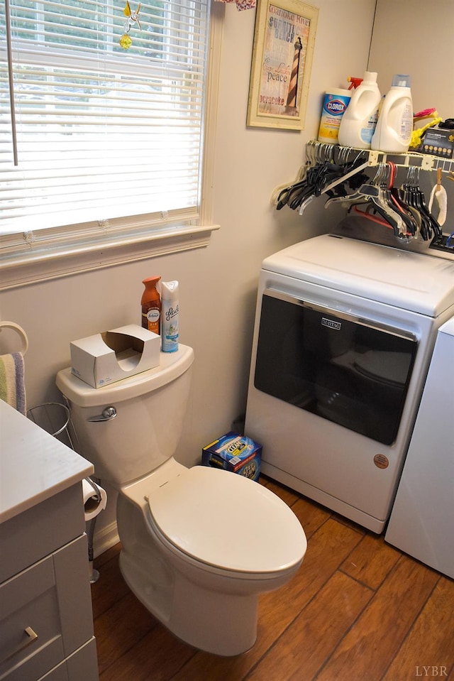 1769 Izaak Walton Rd, Madison Heights, VA 24572 - bathroom with vanity, wood finished floors, and healthy amount of natural light