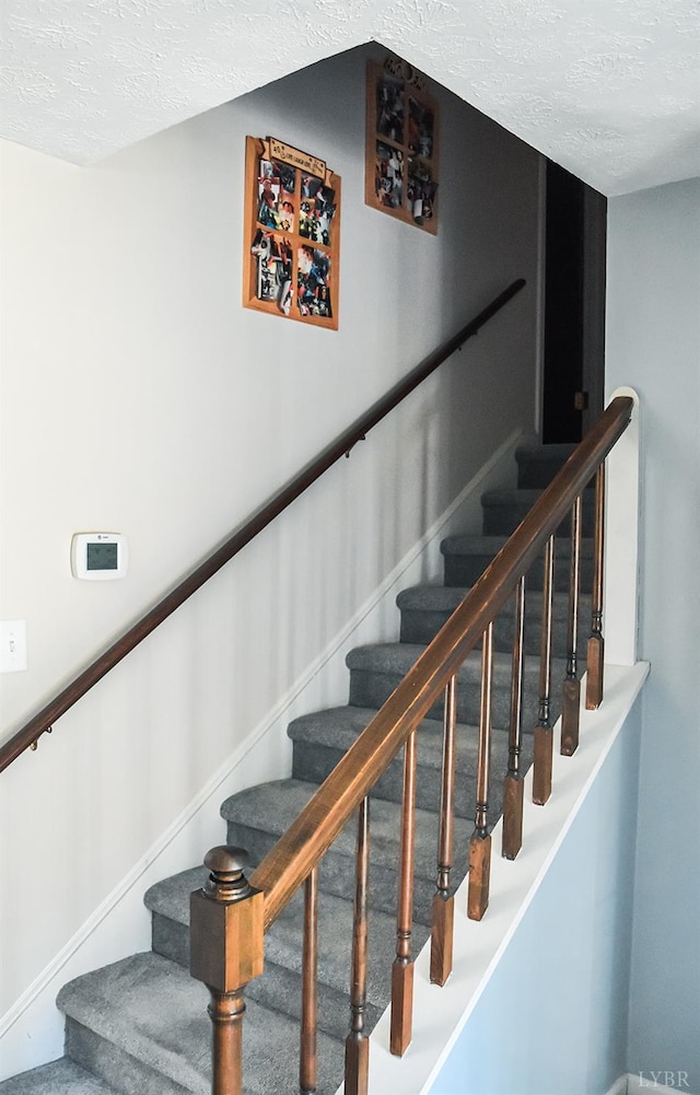 1769 Izaak Walton Rd, Madison Heights, VA 24572 - stairway with a textured ceiling