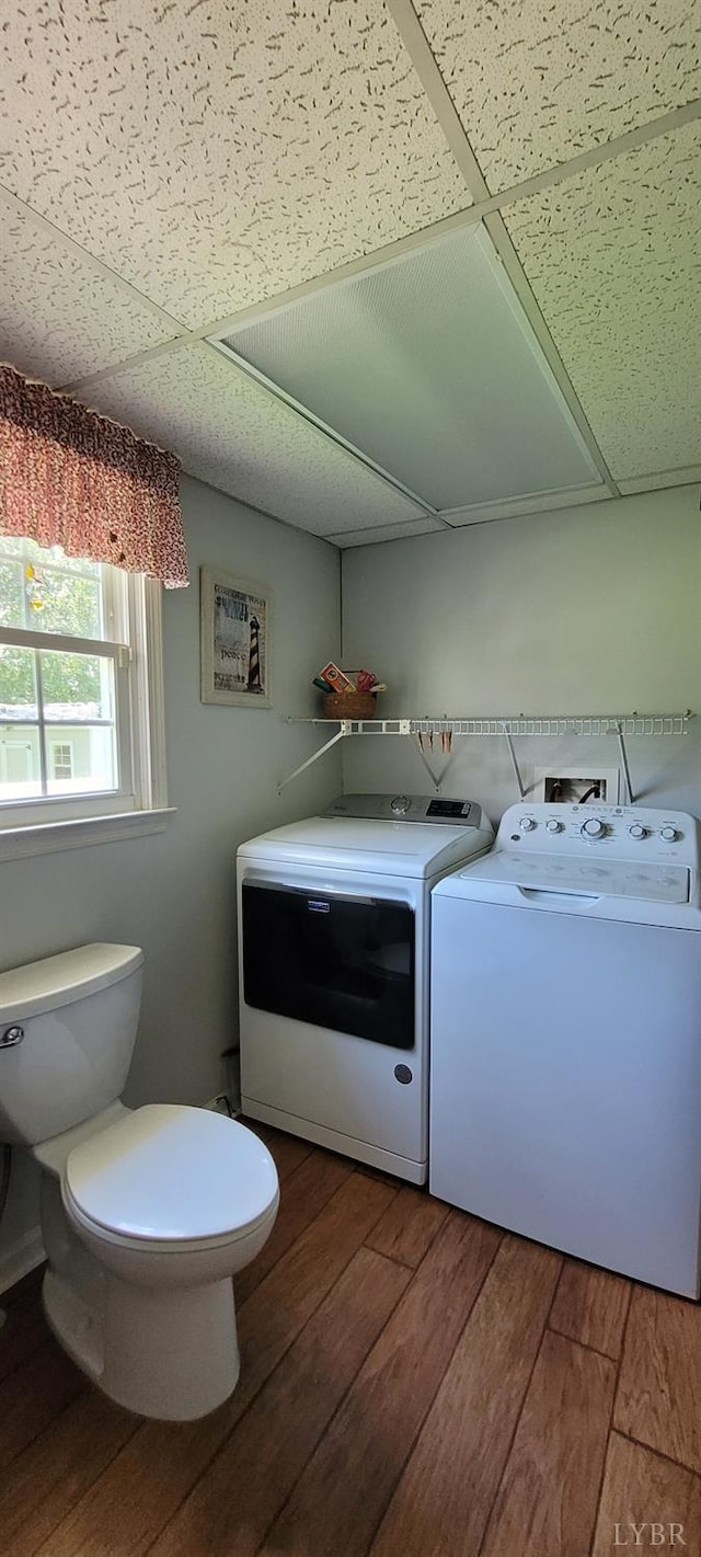 1769 Izaak Walton Rd, Madison Heights, VA 24572 - laundry room with separate washer and dryer and wood finished floors