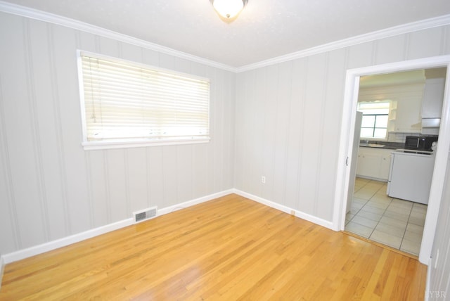 6120 Edgewood Ave, Lynchburg, VA 24502 - empty room featuring ornamental molding and light wood-type flooring