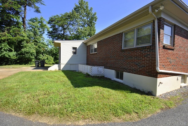 6120 Edgewood Ave, Lynchburg, VA 24502 - view of side of home featuring brick siding and a lawn