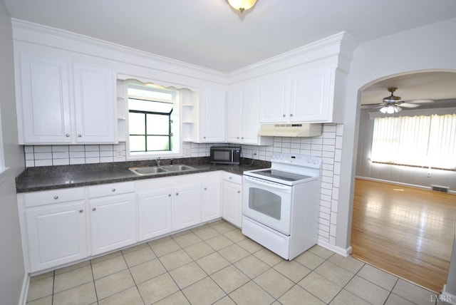 6120 Edgewood Ave, Lynchburg, VA 24502 - kitchen featuring white electric range oven, stainless steel microwave, open shelves, under cabinet range hood, and dark countertops