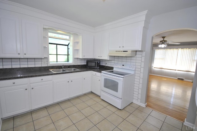 6120 Edgewood Ave, Lynchburg, VA 24502 - kitchen with white electric stove, under cabinet range hood, open shelves, white cabinets, and dark countertops