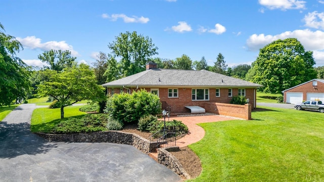 2833 Link Rd, Lynchburg, VA 24503 - back of house featuring a yard, a chimney, brick siding, and a patio area