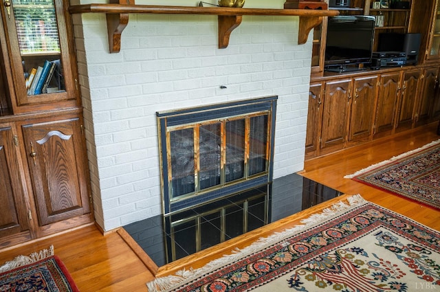 2833 Link Rd, Lynchburg, VA 24503 - detailed view of wood finished floors and a fireplace