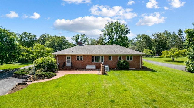2833 Link Rd, Lynchburg, VA 24503 - rear view of property featuring a lawn, brick siding, a chimney, and entry steps