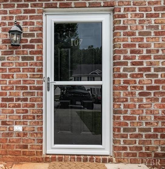 3600 Old Forest Rd Unit 107, Lynchburg, VA 24501 - doorway to property featuring brick siding