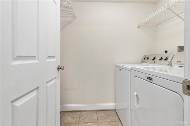 3600 Old Forest Rd Unit 107, Lynchburg, VA 24501 - laundry room featuring independent washer and dryer and light tile patterned floors
