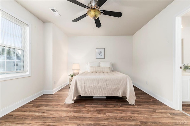 3600 Old Forest Rd Unit 107, Lynchburg, VA 24501 - bedroom featuring wood finished floors, connected bathroom, and a ceiling fan