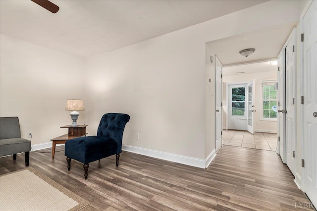 3600 Old Forest Rd Unit 107, Lynchburg, VA 24501 - living area with light wood finished floors and a ceiling fan