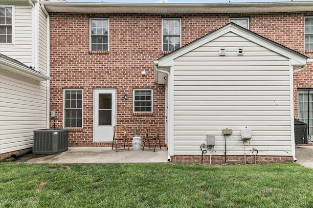 3600 Old Forest Rd Unit 107, Lynchburg, VA 24501 - rear view of house with a yard, a patio, and brick siding