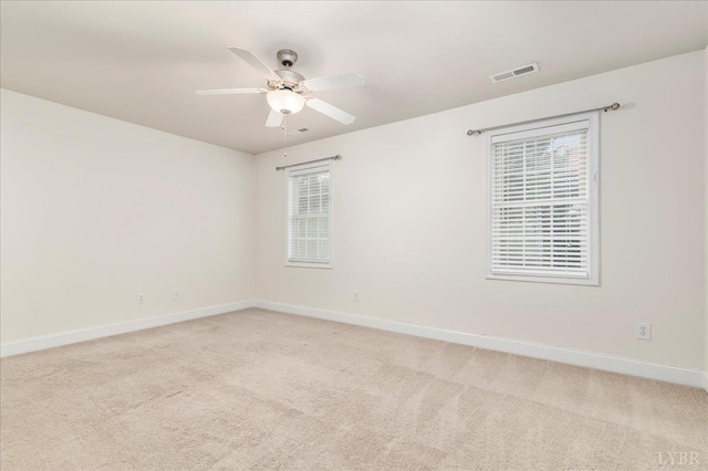 3600 Old Forest Rd Unit 107, Lynchburg, VA 24501 - spare room with light colored carpet, ceiling fan, and healthy amount of natural light
