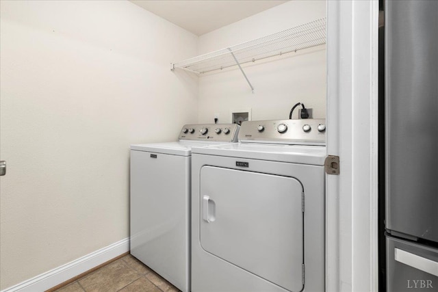 3600 Old Forest Rd Unit 107, Lynchburg, VA 24501 - laundry room featuring washer and dryer and light tile patterned floors
