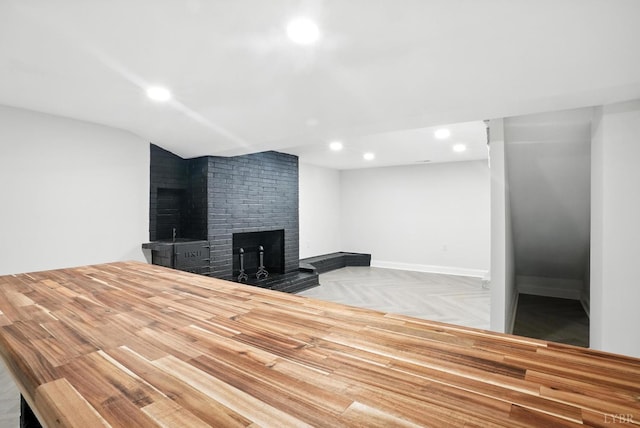 39 Lynview Dr, Lynchburg, VA 24502 - unfurnished living room with a fireplace, recessed lighting, and vaulted ceiling
