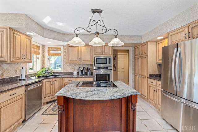 112 Haines Point Ter, Forest, VA 24551 - kitchen featuring stainless steel appliances, a center island, light tile patterned floors, and dark stone counters