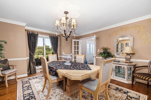 112 Haines Point Ter, Forest, VA 24551 - dining room featuring a chandelier, french doors, crown molding, and wood finished floors