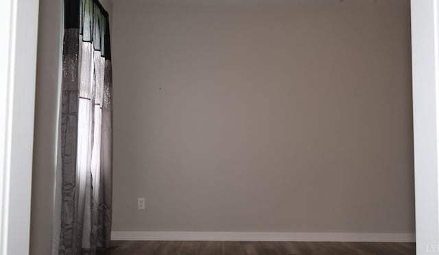863 Winfall Rd, Gladys, VA 24554 - spare room featuring dark wood-style floors and baseboards