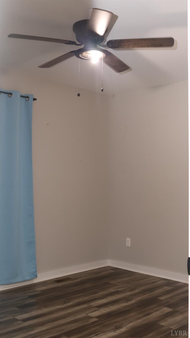863 Winfall Rd, Gladys, VA 24554 - spare room featuring a ceiling fan and dark wood-style flooring