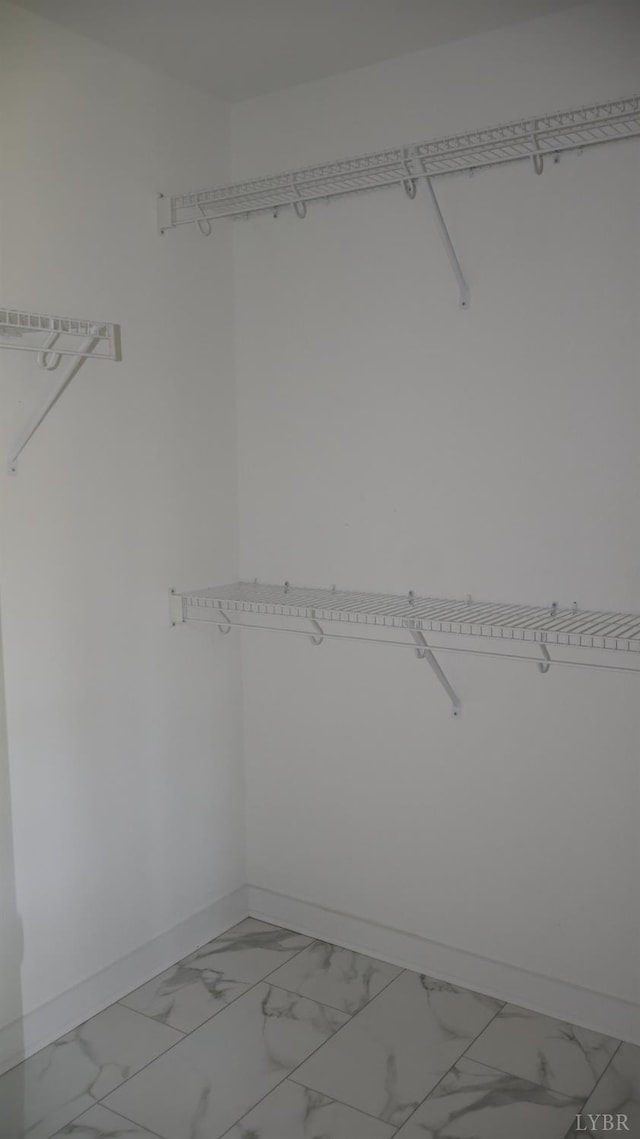863 Winfall Rd, Gladys, VA 24554 - walk in closet with light marble finish flooring