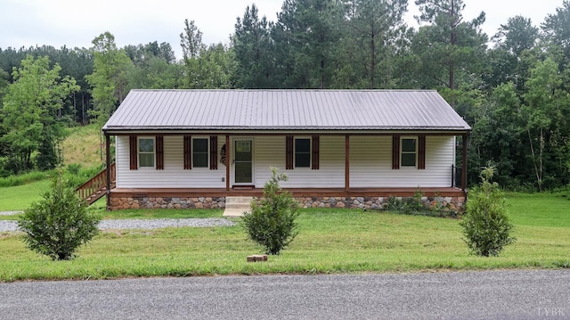 863 Winfall Rd, Gladys, VA 24554 - view of front of property with covered porch, a metal roof, and a front lawn