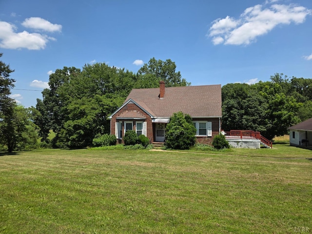 2224 Wildway Rd, Appomattox, VA 24522 - view of front facade featuring a deck, a front lawn, brick siding, and a chimney