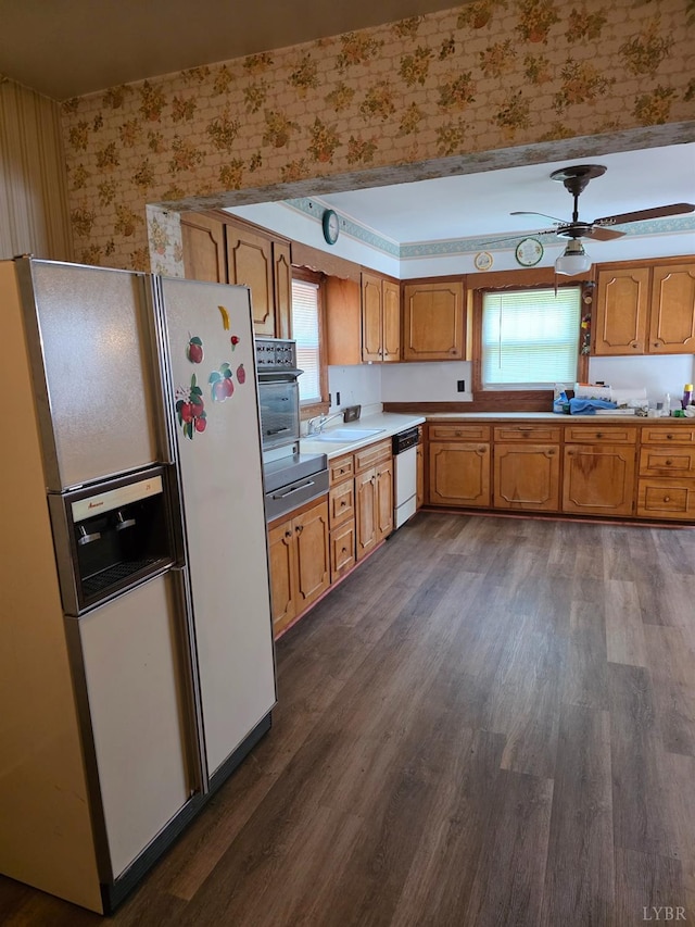 2224 Wildway Rd, Appomattox, VA 24522 - kitchen with white appliances, wallpapered walls, dark wood finished floors, a ceiling fan, and brown cabinets