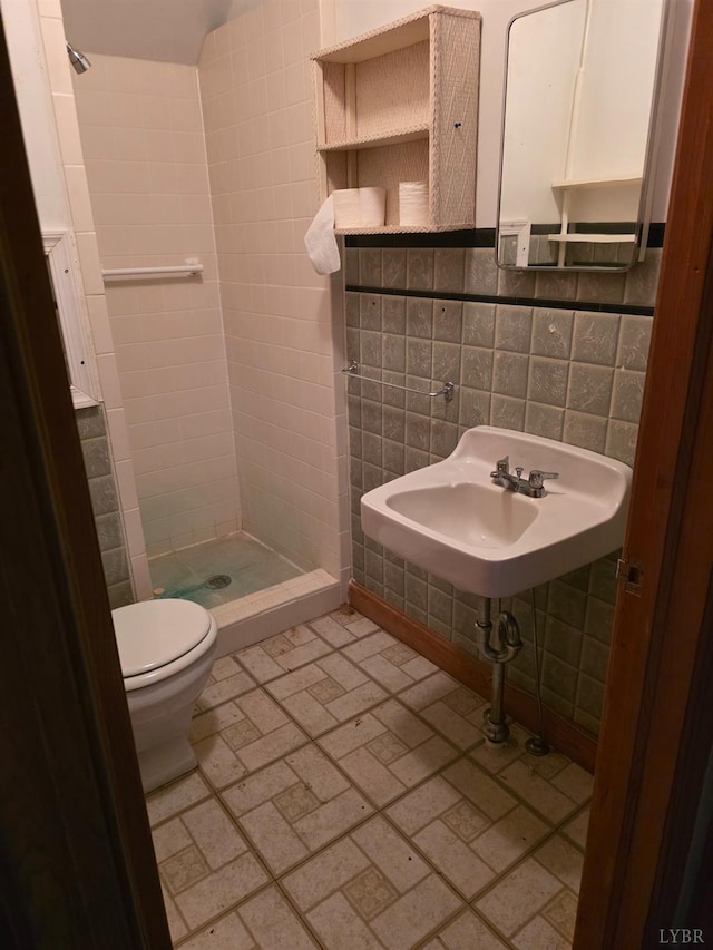 2224 Wildway Rd, Appomattox, VA 24522 - bathroom with a shower stall, tile walls, and brick patterned flooring