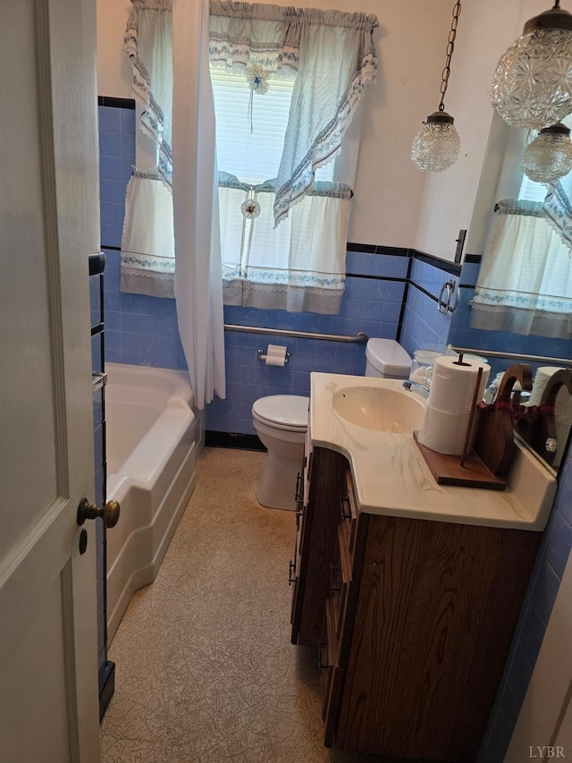 2224 Wildway Rd, Appomattox, VA 24522 - full bathroom featuring vanity, tile walls, and wainscoting