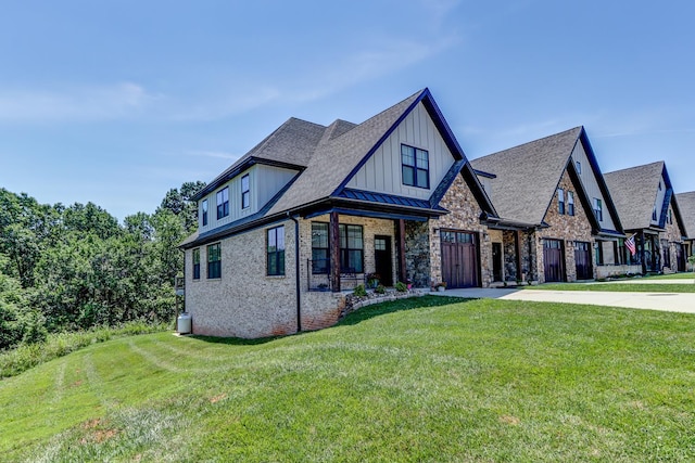 1659 Helmsdale Dr, Forest, VA 24551 - view of front of home featuring board and batten siding, a front yard, and brick siding