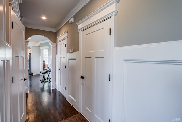 1659 Helmsdale Dr, Forest, VA 24551 - corridor featuring decorative columns, arched walkways, dark wood-style flooring, crown molding, and recessed lighting