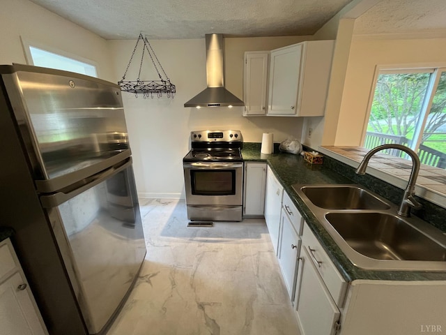 115 Primrose Ln, Lynchburg, VA 24501 - kitchen with stainless steel appliances, wall chimney exhaust hood, a textured ceiling, light marble finish flooring, and dark countertops