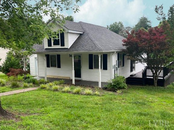 115 Primrose Ln, Lynchburg, VA 24501 - farmhouse with a front lawn, a shingled roof, and covered porch