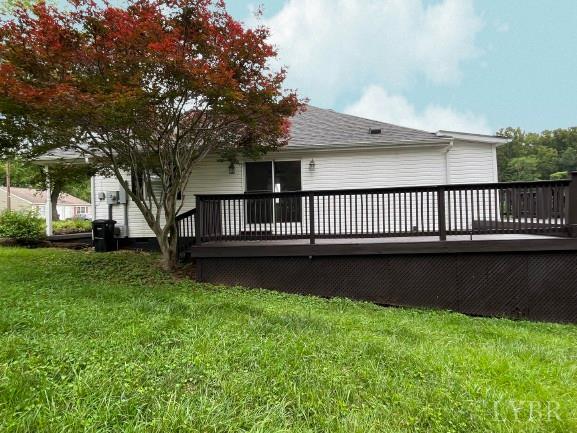 115 Primrose Ln, Lynchburg, VA 24501 - rear view of house featuring a wooden deck and a yard