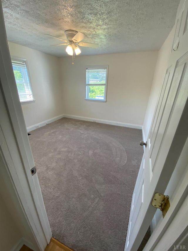 115 Primrose Ln, Lynchburg, VA 24501 - empty room with carpet, a textured ceiling, and ceiling fan