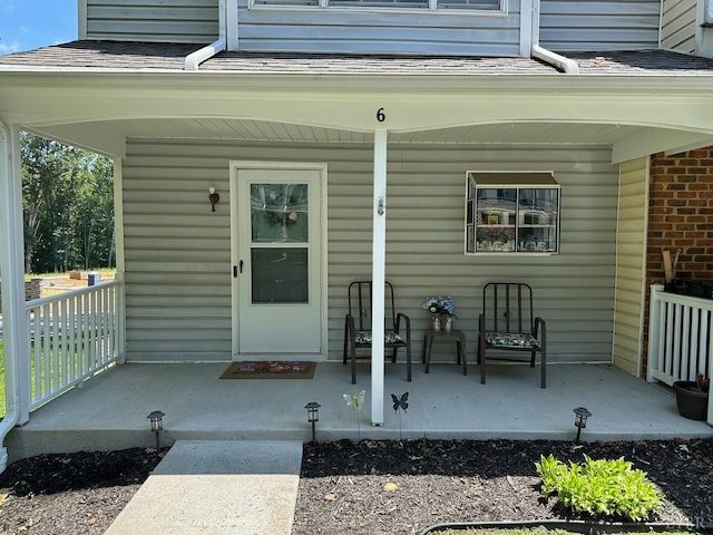 6 Jefferson Village Dr, Forest, VA 24551 - doorway to property with a porch and a shingled roof