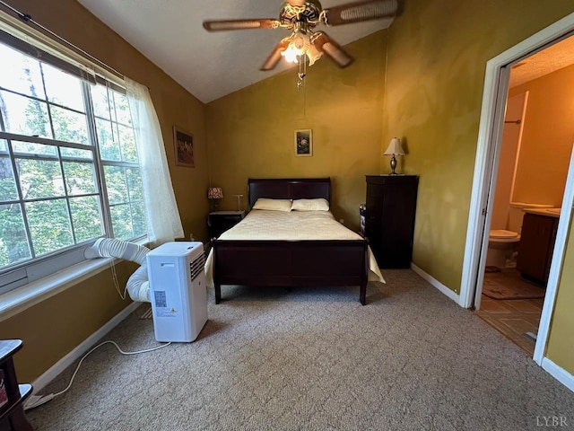 6 Jefferson Village Dr, Forest, VA 24551 - carpeted bedroom featuring multiple windows, vaulted ceiling, ensuite bath, and ceiling fan