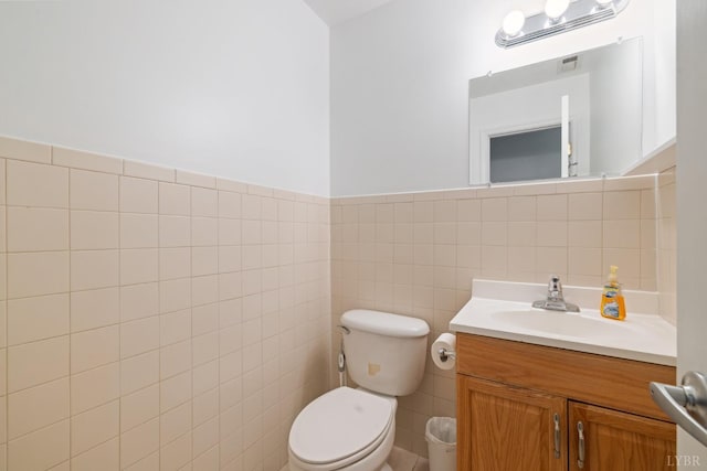 2398 Azalea Garden Rd, Norfolk, VA 23513 - bathroom featuring tile walls, vanity, and a wainscoted wall