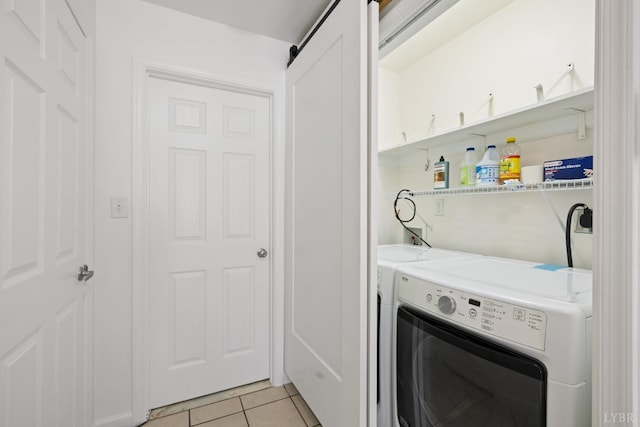 2398 Azalea Garden Rd, Norfolk, VA 23513 - washroom with light tile patterned floors and separate washer and dryer