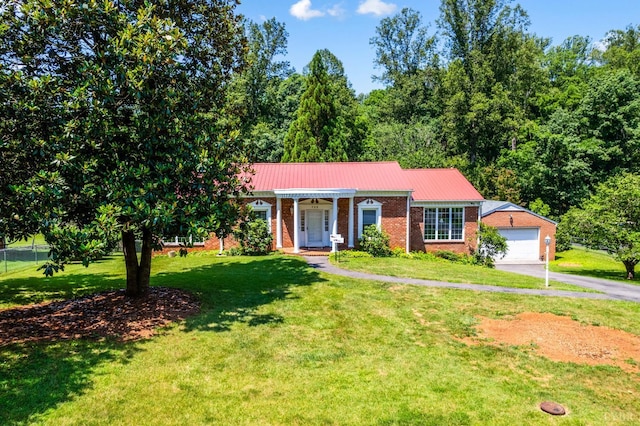 723 Custer Dr, Lynchburg, VA 24502 - single story home featuring a garage, brick siding, a front lawn, and a metal roof