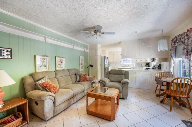 723 Custer Dr, Lynchburg, VA 24502 - living area with crown molding, ceiling fan, a textured ceiling, and light tile patterned flooring