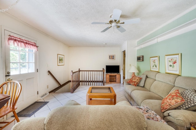 723 Custer Dr, Lynchburg, VA 24502 - living area featuring light tile patterned flooring, ceiling fan, a textured ceiling, and crown molding