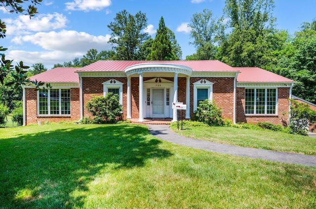 723 Custer Dr, Lynchburg, VA 24502 - view of front of property with a front lawn, a metal roof, and brick siding