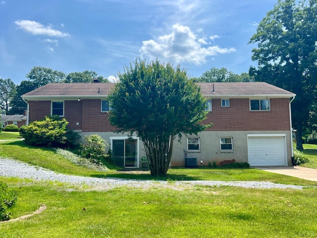 149 Powtan Dr, Lynchburg, VA 24502 - back of house with an attached garage, brick siding, concrete driveway, and a lawn