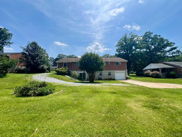 149 Powtan Dr, Lynchburg, VA 24502 - view of home's exterior featuring driveway, an attached garage, and a lawn
