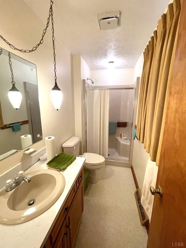 1102 Smith St, Bedford, VA 24523 - bathroom featuring a shower stall, vanity, and a textured ceiling