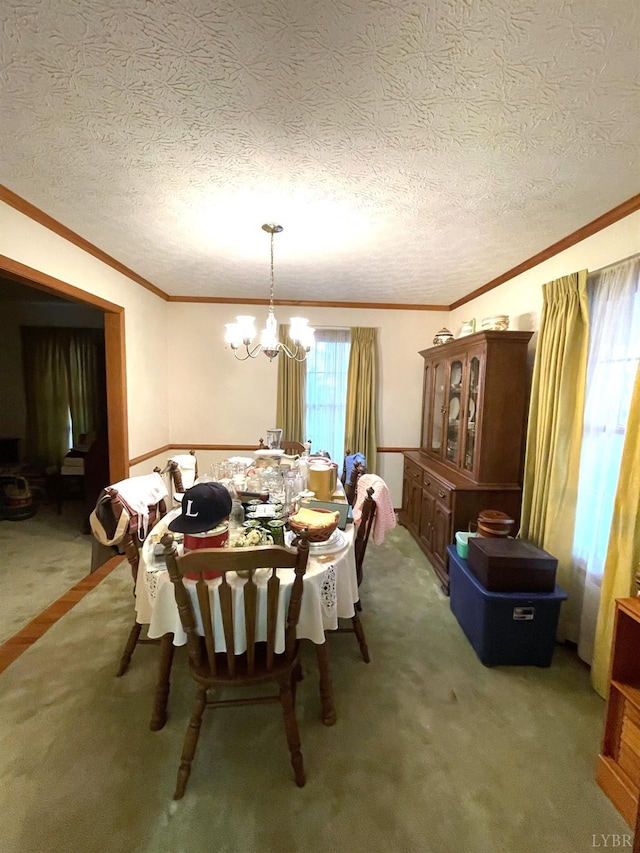 1102 Smith St, Bedford, VA 24523 - dining area with carpet flooring, a chandelier, crown molding, and a textured ceiling