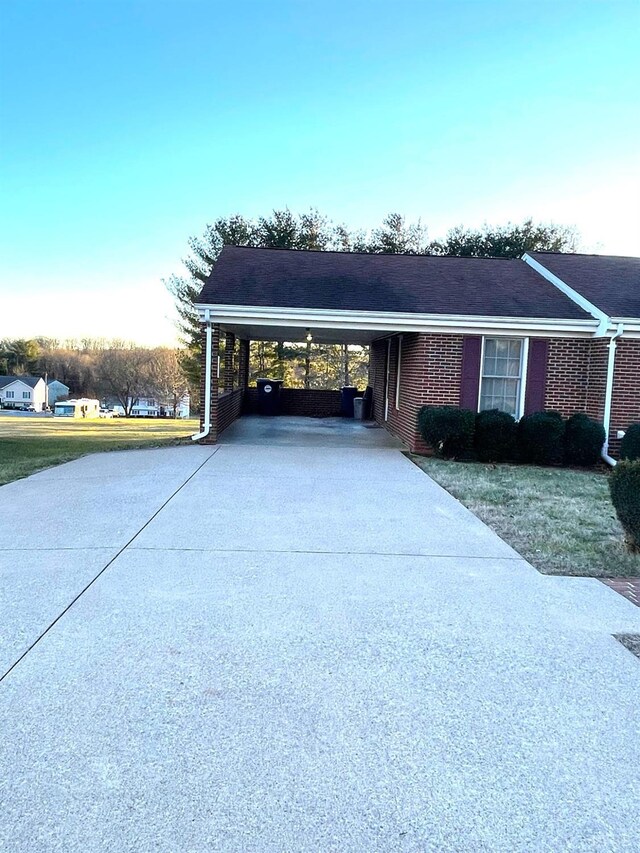 1102 Smith St, Bedford, VA 24523 - exterior space with driveway, an attached carport, and a front yard