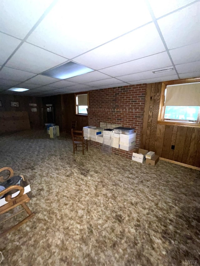 1102 Smith St, Bedford, VA 24523 - below grade area featuring a drop ceiling, carpet floors, and wooden walls